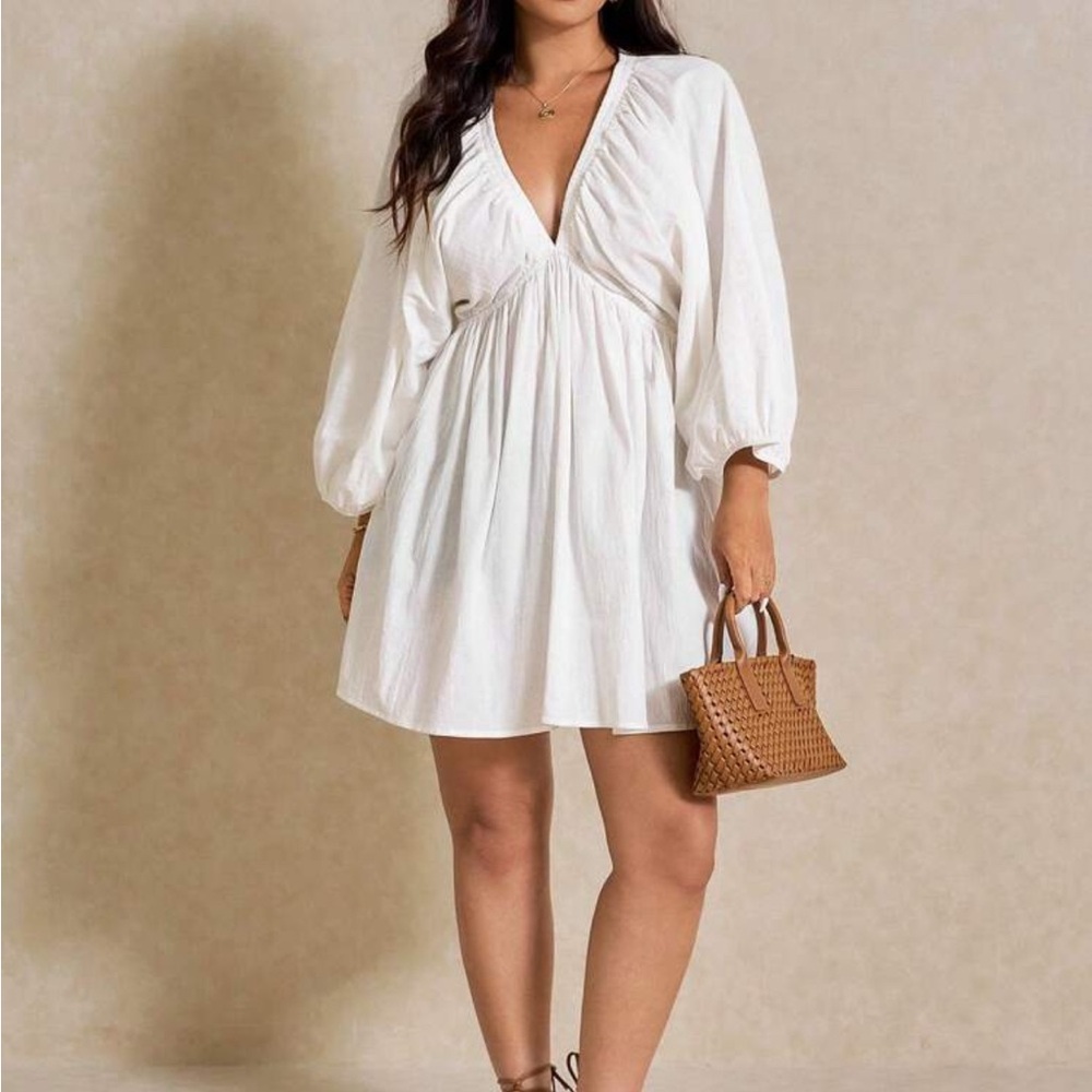 Elegant White V-Neck Dress